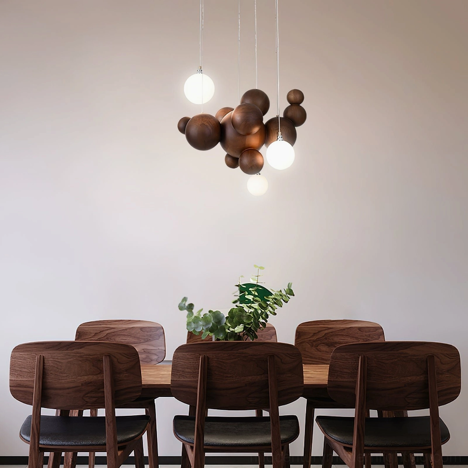 Dark wood bubble chandelier suspended in wabi-sabi tea room with minimalist wooden furniture and warm ambient lighting