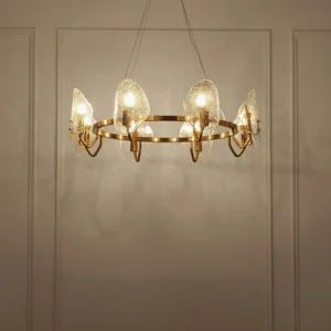 Mid-century modern bubble glass chandelier with warm candle-style bulbs illuminated in contemporary interior