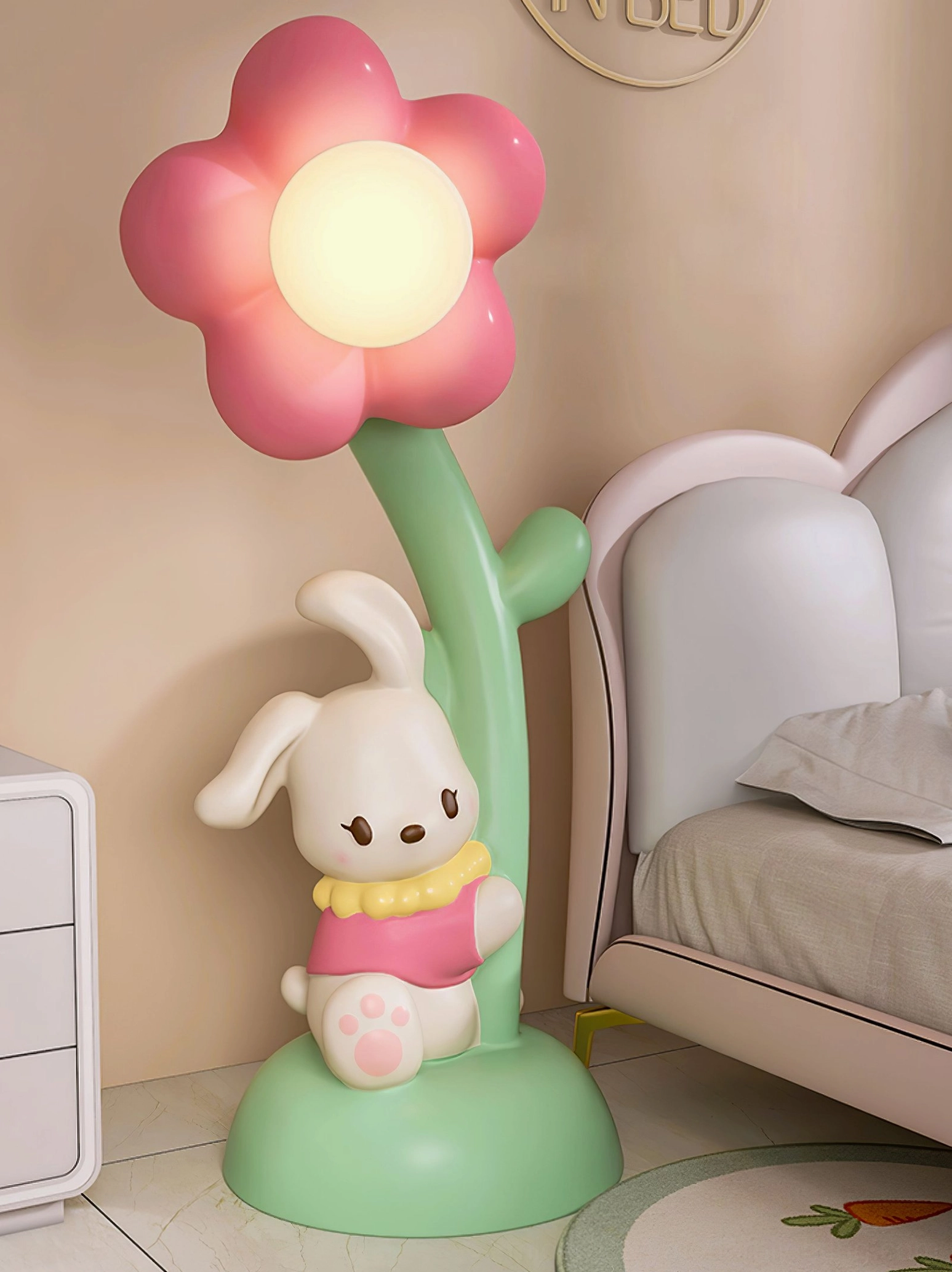 Compact bunny floor lamp as bedside lighting in modern bedroom with upholstered bed frame