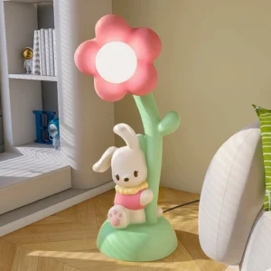 Bunny floor lamp in modern living room with bookshelf, three-quarter view showing soft pink-green aesthetic
