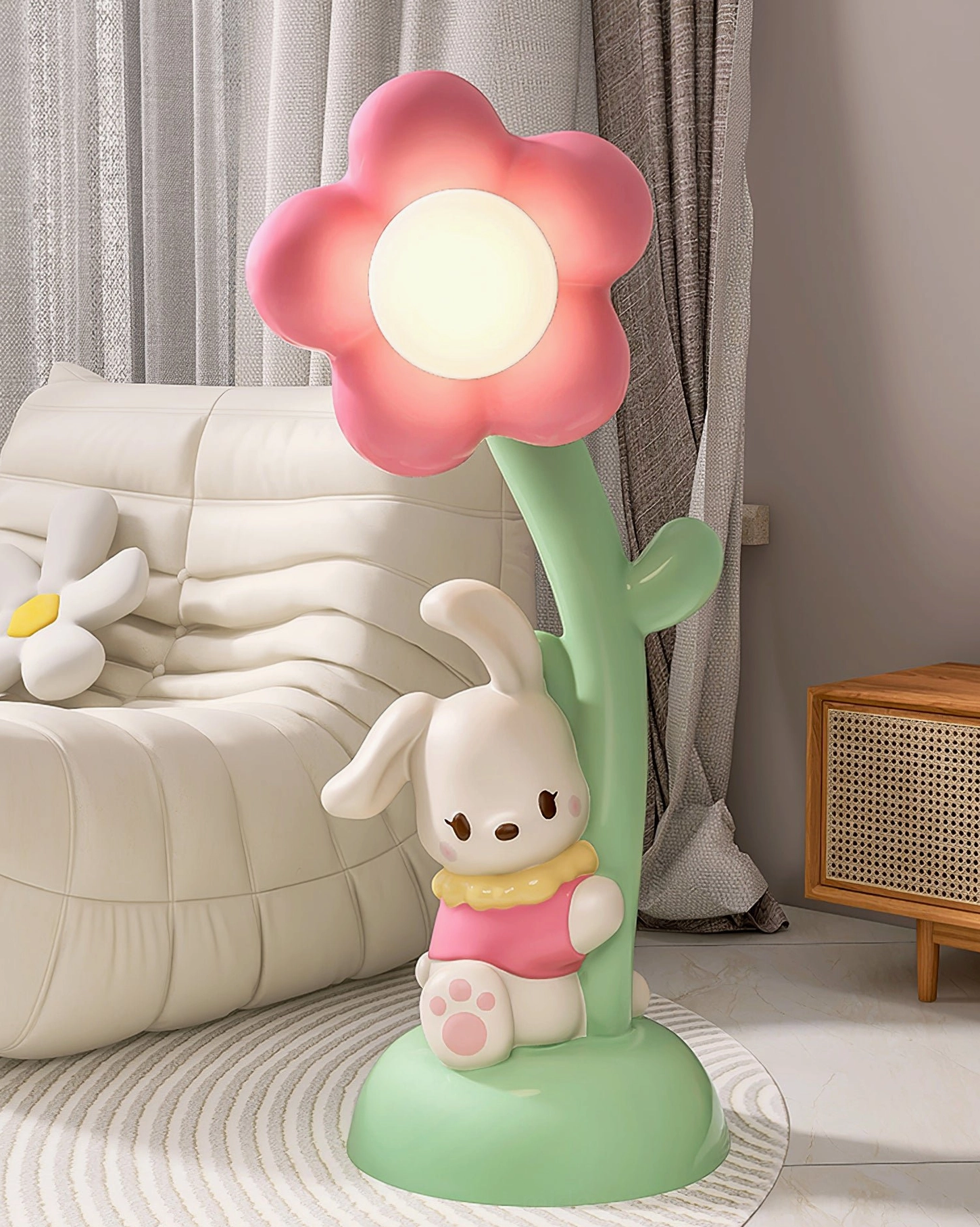 Whimsical bunny floor lamp warm glow in living room with plush sofa, home accent lighting
