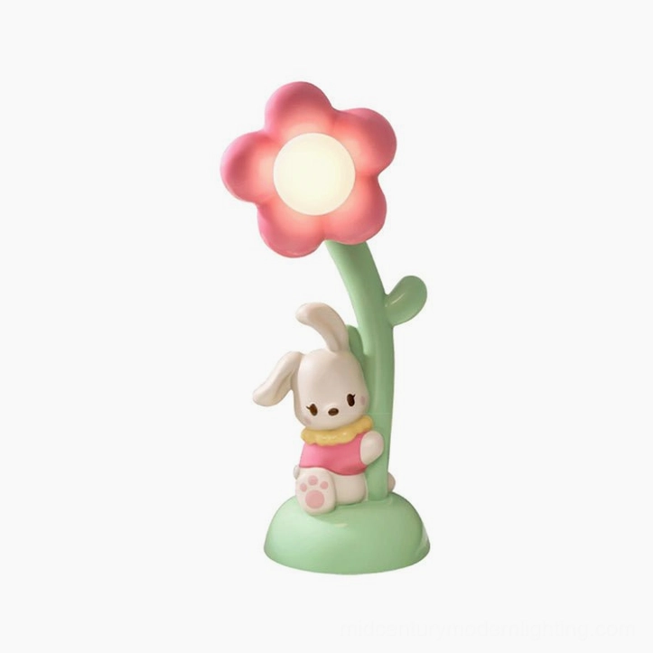 Whimsical bunny and flower LED floor lamp with pink and green pastel design, front view studio shot