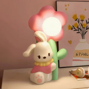 Modern Bunny Flower Table Lamp in bedroom nightstand setting with warm ambient lighting and pink floral shade