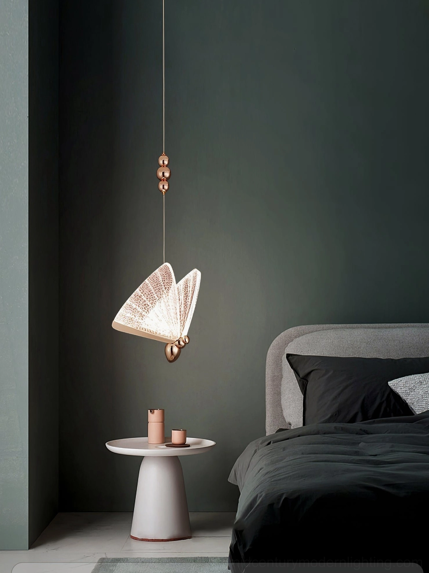 Butterfly pendant light showing translucent acrylic diffuser