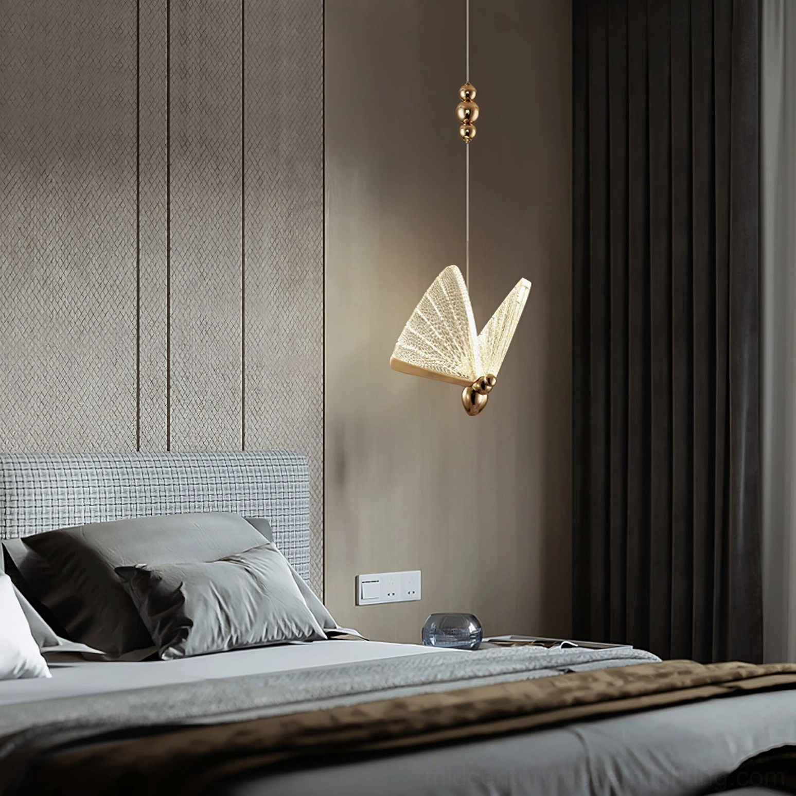 Single butterfly pendant light in minimalist luxury bedroom with neutral tones