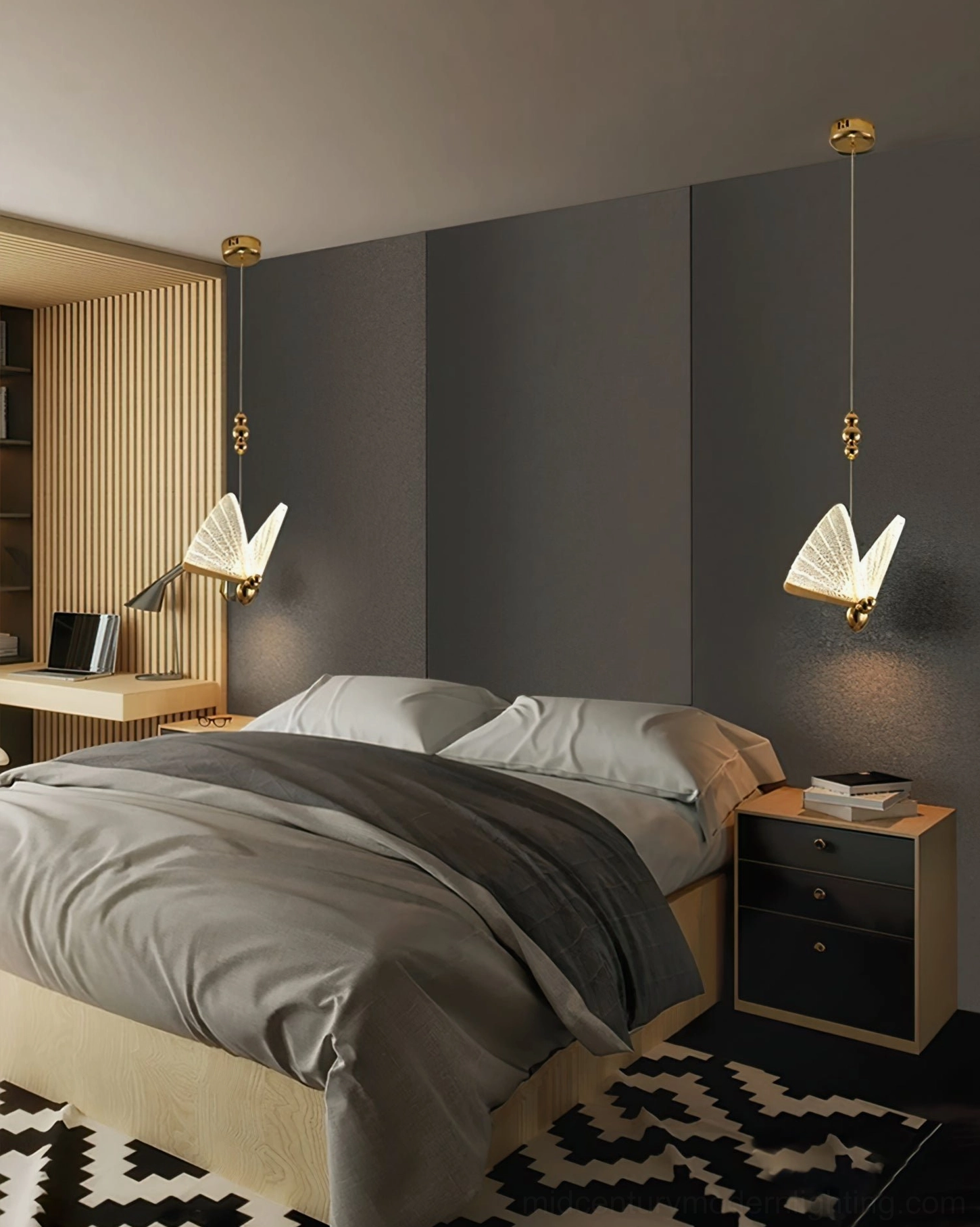 Single butterfly pendant light in modern bedroom with geometric rug and wooden bedside furniture