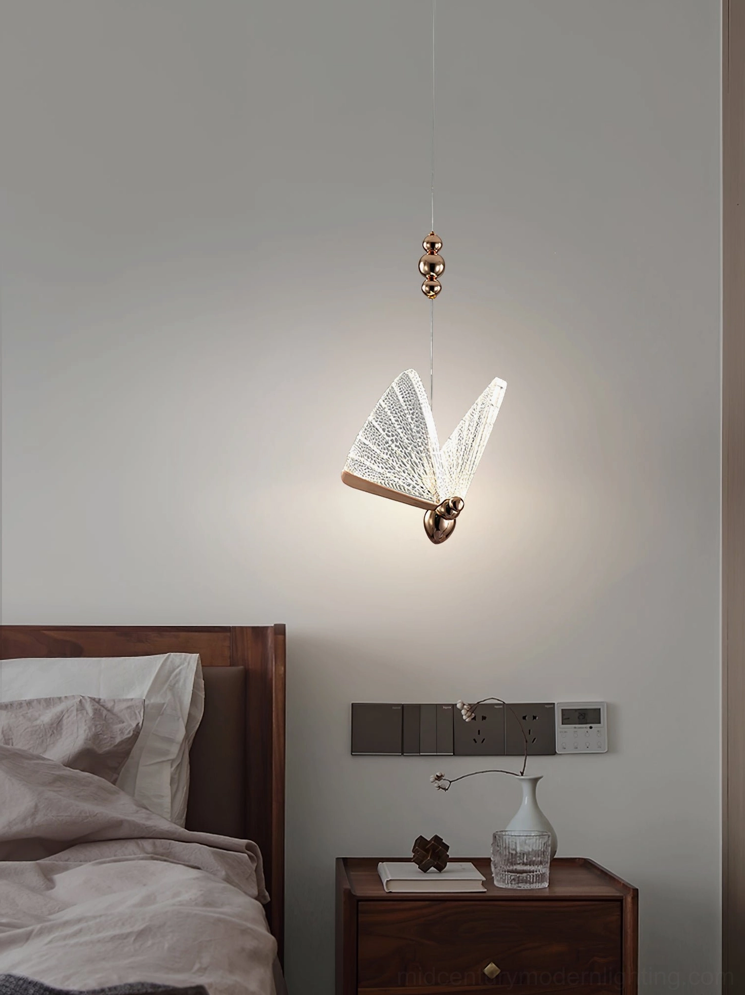 Butterfly pendant light fixture with integrated LED