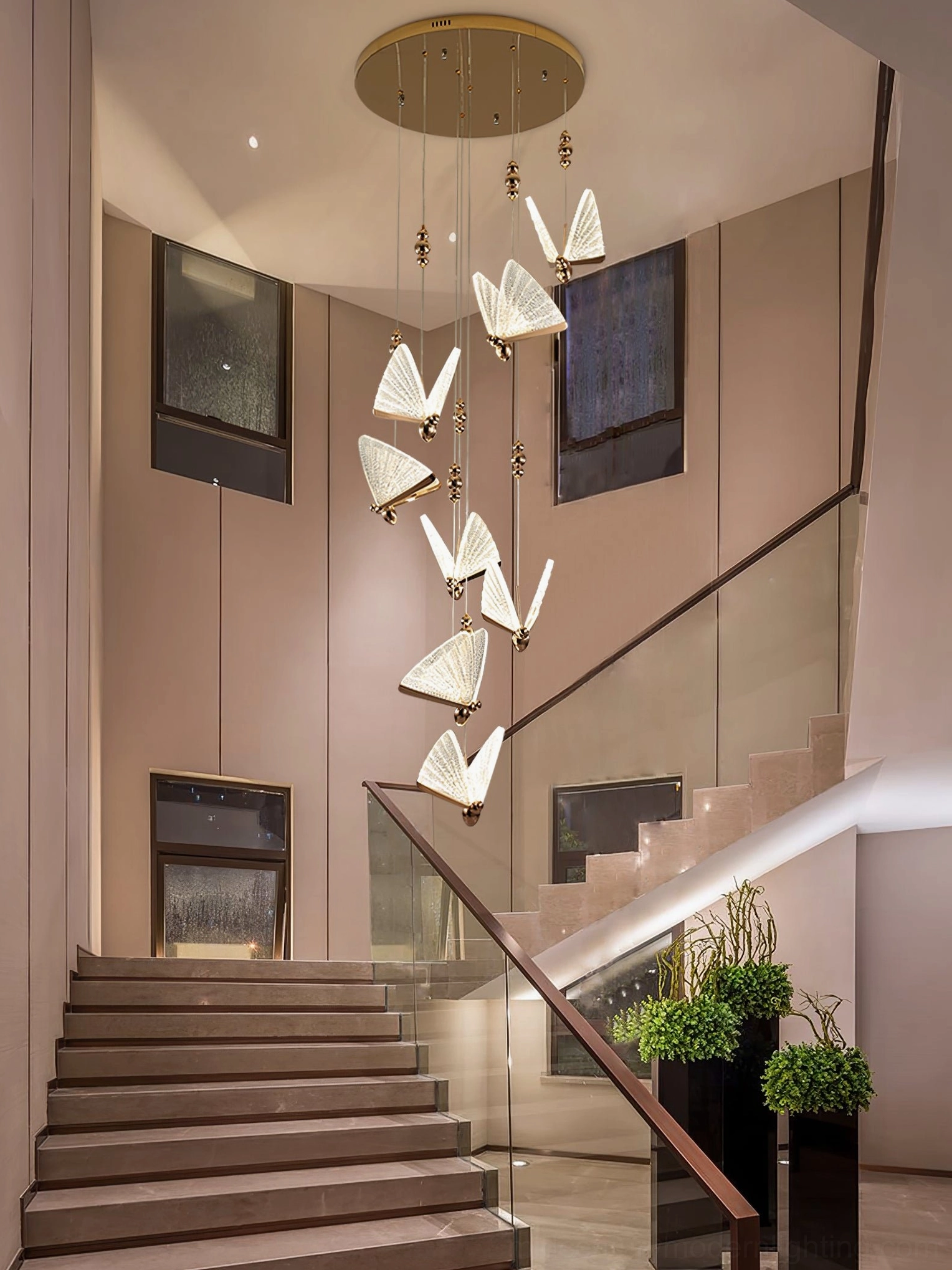 Butterfly pendant light warm LED glow in room setting