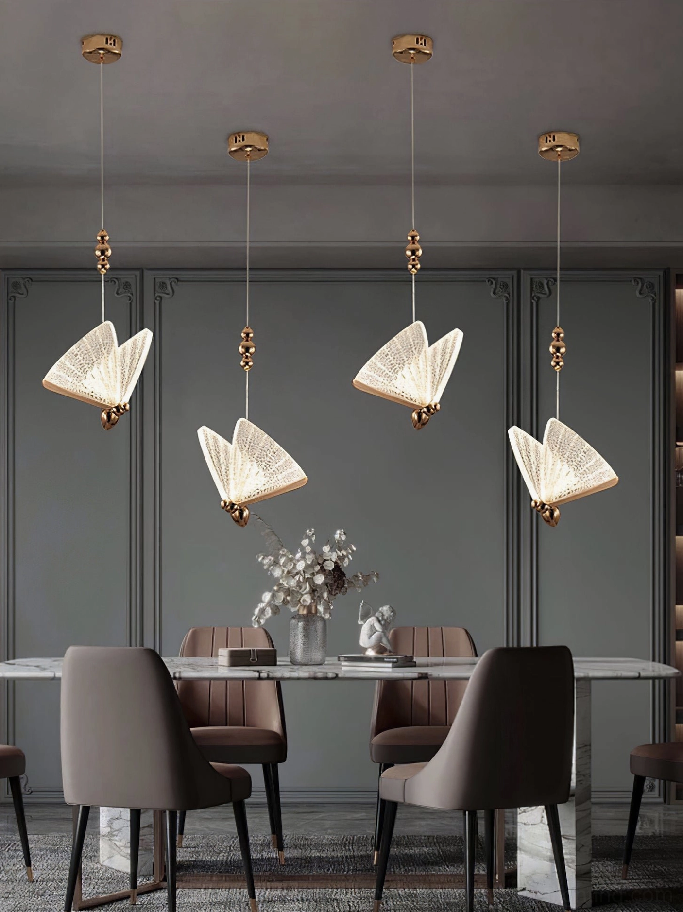 Butterfly pendant light showing delicate wing translucence