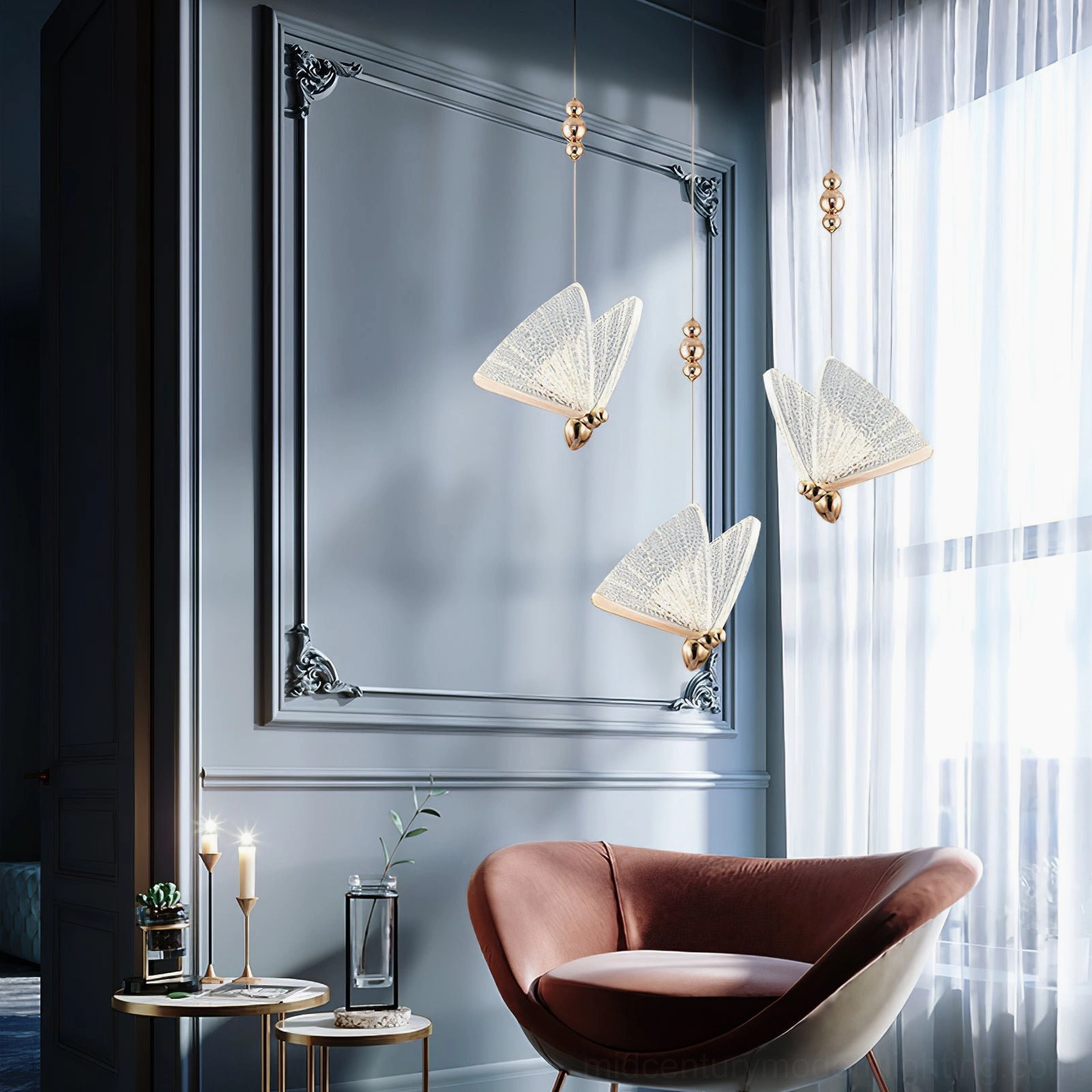 Triple butterfly pendant lights in elegant formal living room with ornate trim and curtains