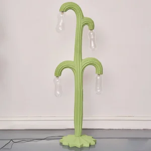 Side view of cactus floor lamp showing curved ribbed segments and clear G9 bulb holders