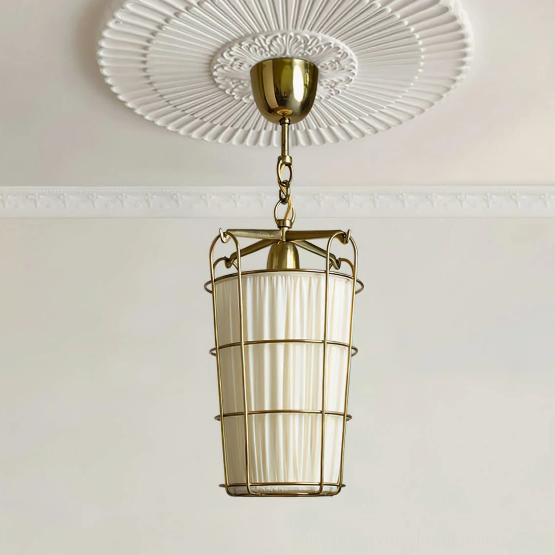 Upward view of caged chandelier against embossed ceiling medallion in French retro decorative style