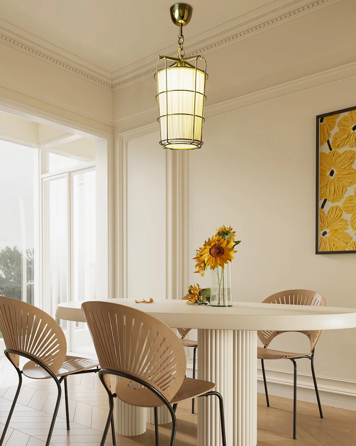 Caged chandelier in bright dining area with sunflower decor and yellow wall art, creating warm ambiance