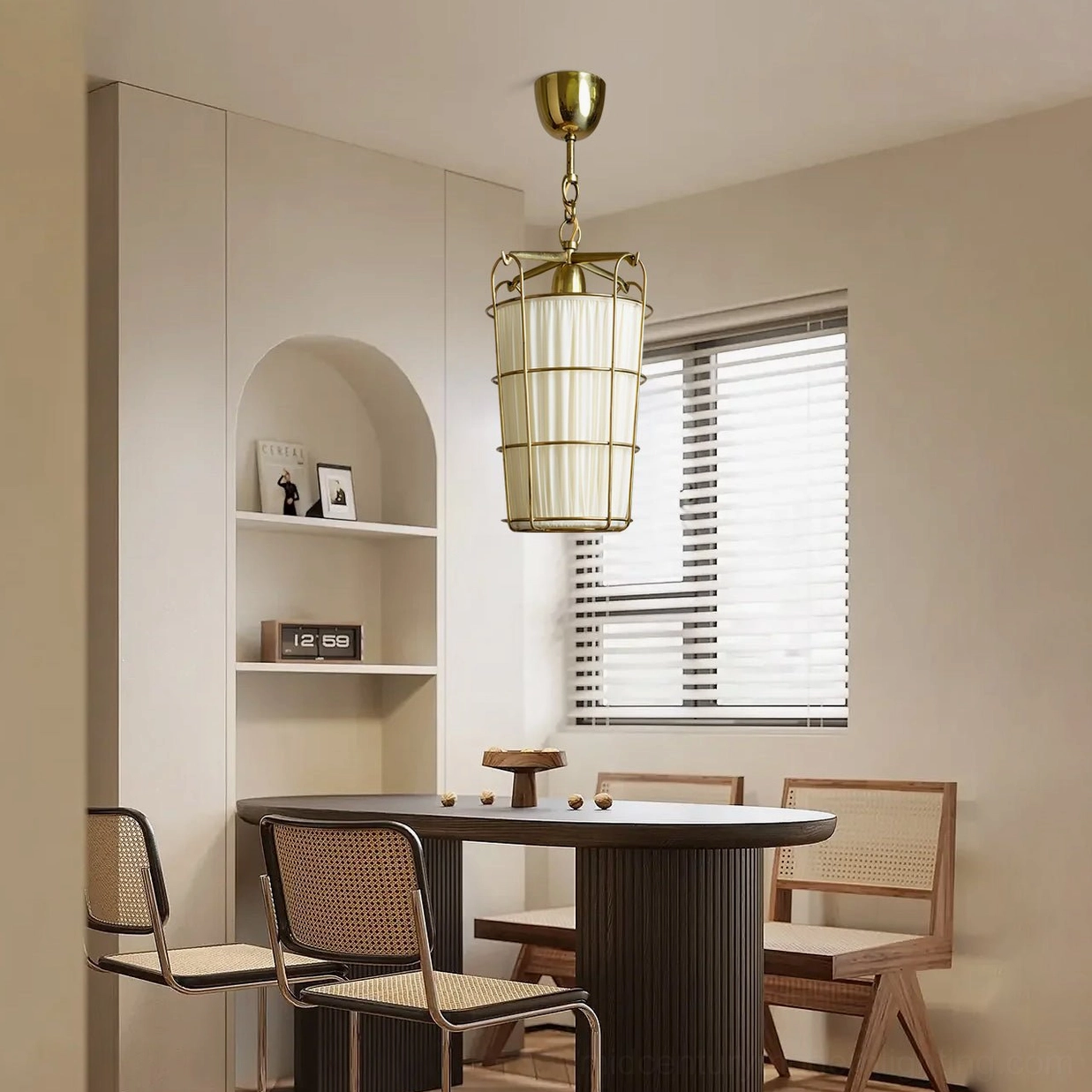 Mid-century modern caged chandelier installed in cream dining room with rattan chairs and dark wooden table