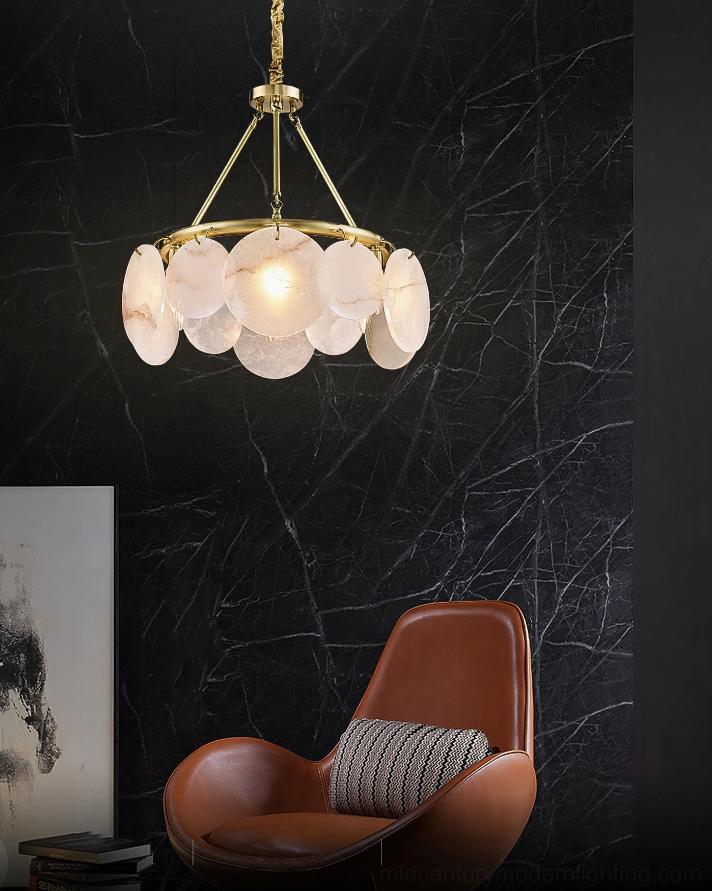 Calamete alabaster chandelier low angle view in luxury living room, black marble accent wall, leather furniture, modern home interior lighting