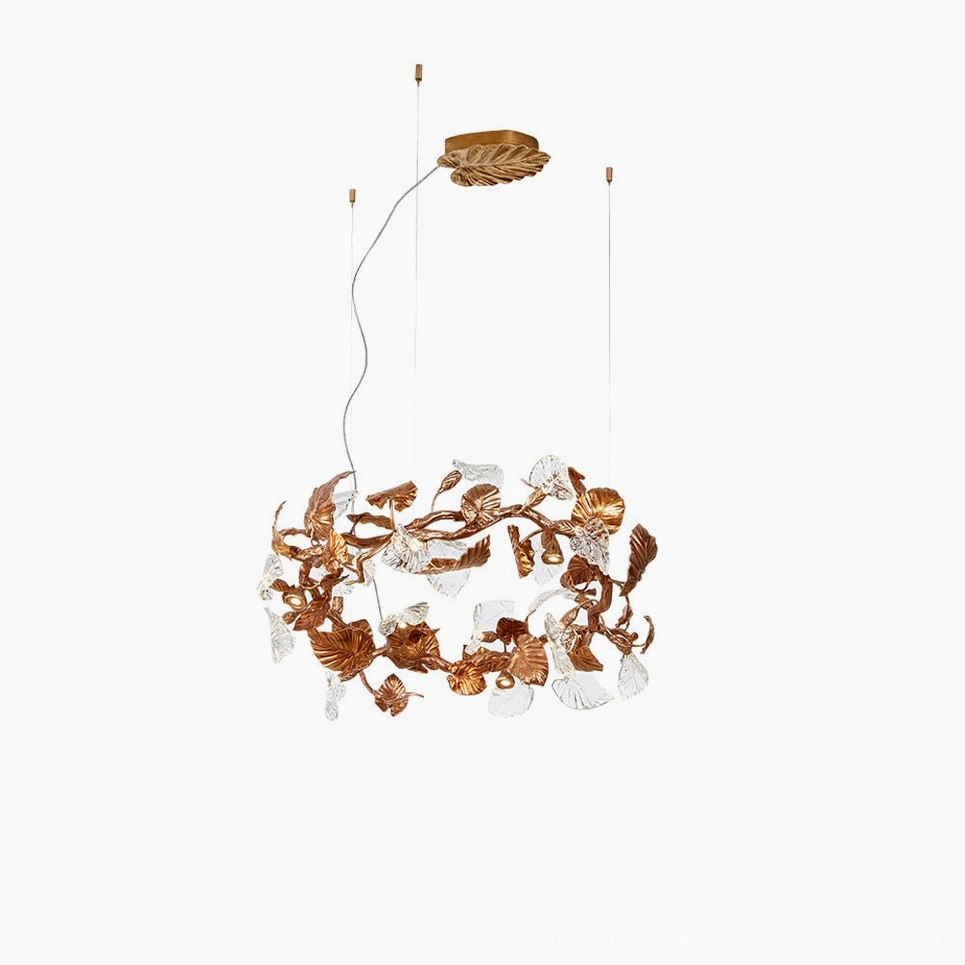 Compact circular Calathea chandelier with small brass ring and intricate vine details, front-angled perspective