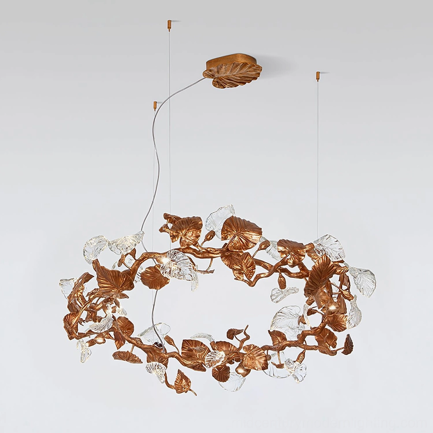Medium Calathea chandelier with single suspension cable and ginkgo leaf motifs in antique copper and clear glass