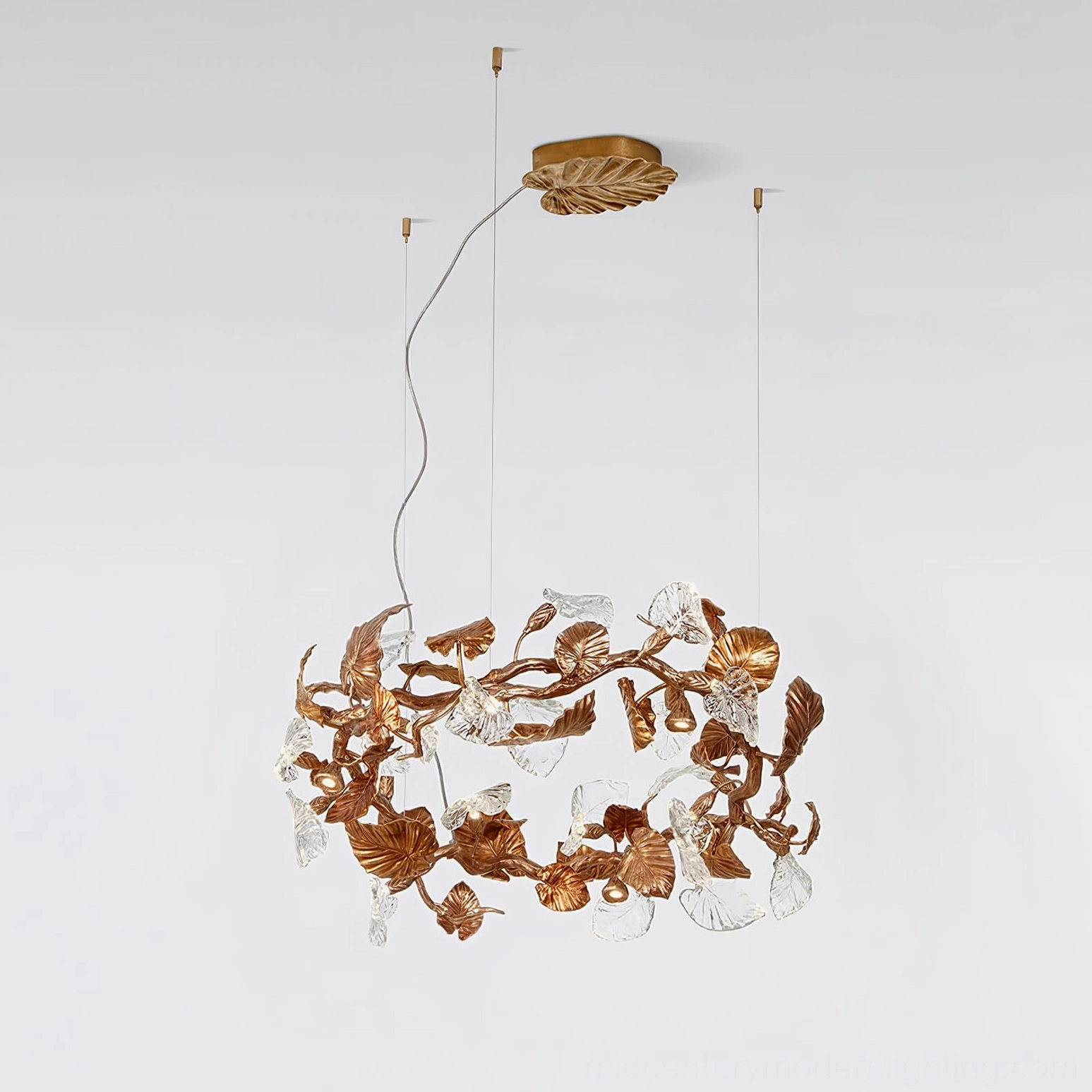 Compact Calathea leaf chandelier with multiple suspension cords and brass ceiling mount, flat front view of delicate glass foliage