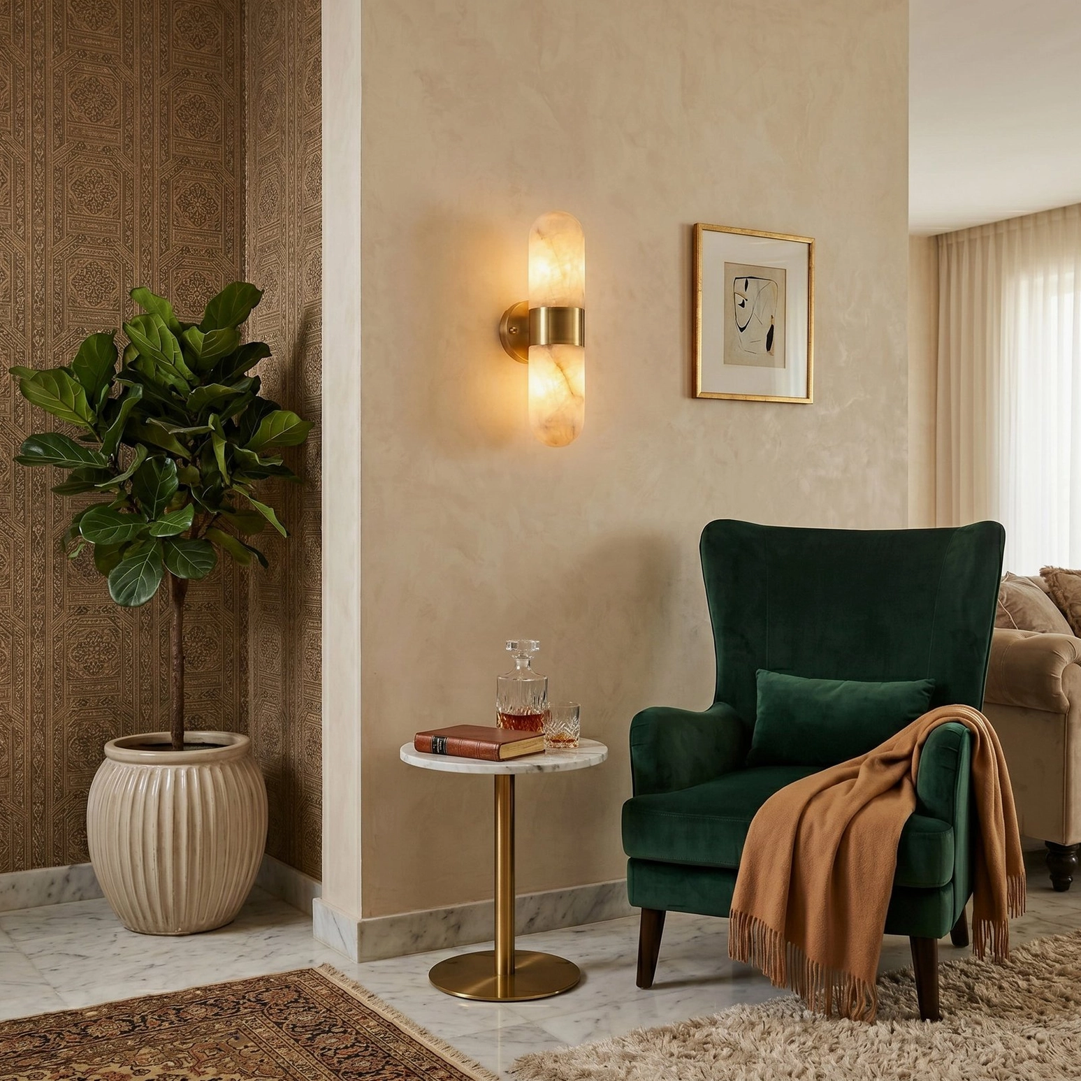 Single alabaster wall sconce providing reading light in cozy living room corner beside green velvet armchair