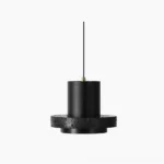 Calm black stone pendant lamp studio product shot - minimalist modern lighting fixture with matte black finish