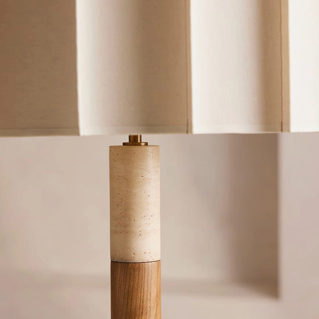 Close-up macro detail of Calypso lamp travertine stone and solid wood connection joint showing craftsmanship and material contrast