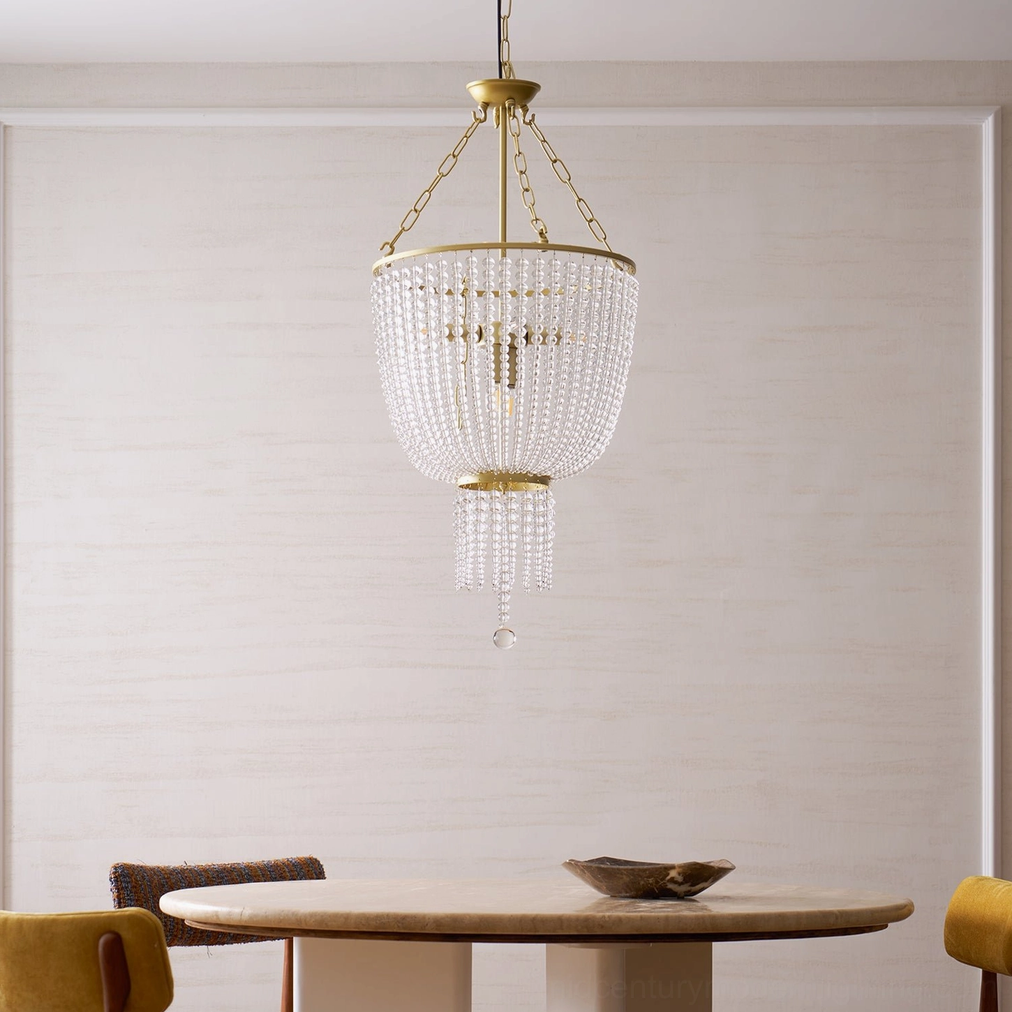 Campana crystal chandelier detail shot showing cascading crystal beads and golden brass framework