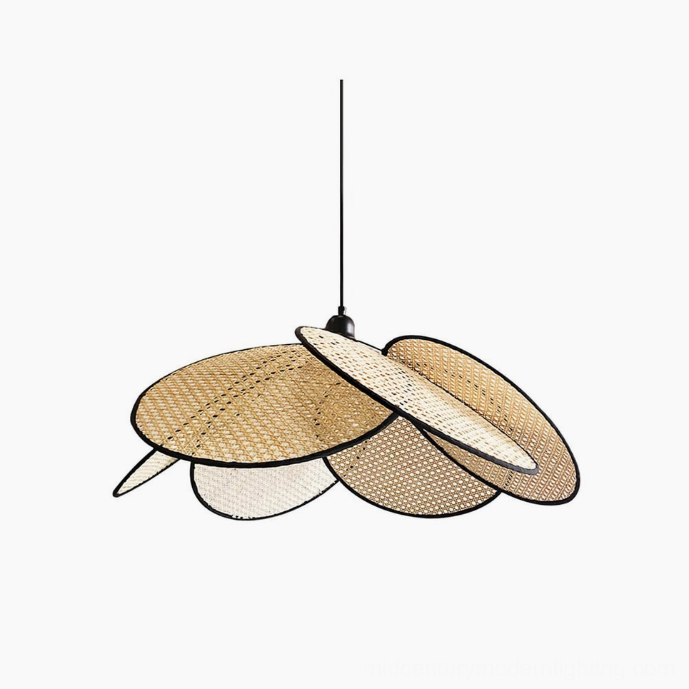 Campbell rattan petal pendant lamp with layered woven design and black metal frame, studio front view showing organic flower-like silhouette