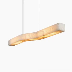 Camur linear alabaster chandelier in white stone with warm brass frame, studio product photography on white background
