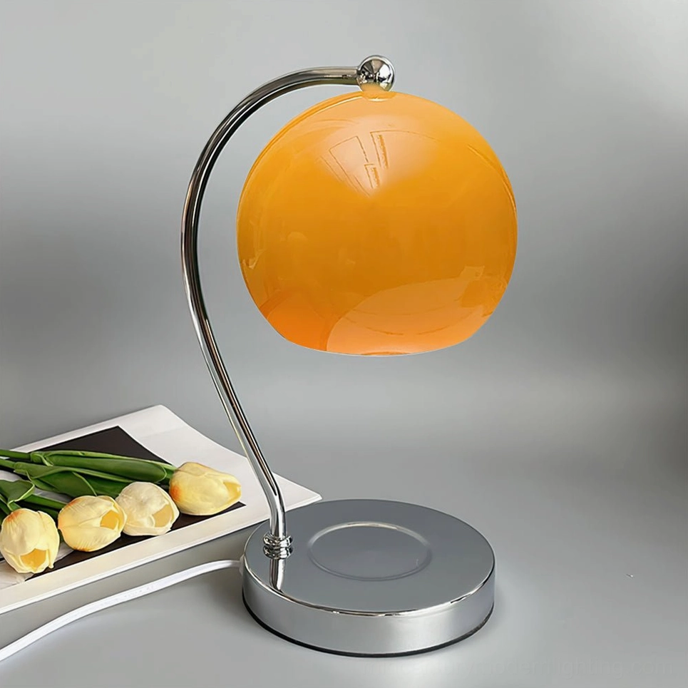 Sphere lamp with metal base warm ambient glow evening relaxation atmosphere creation