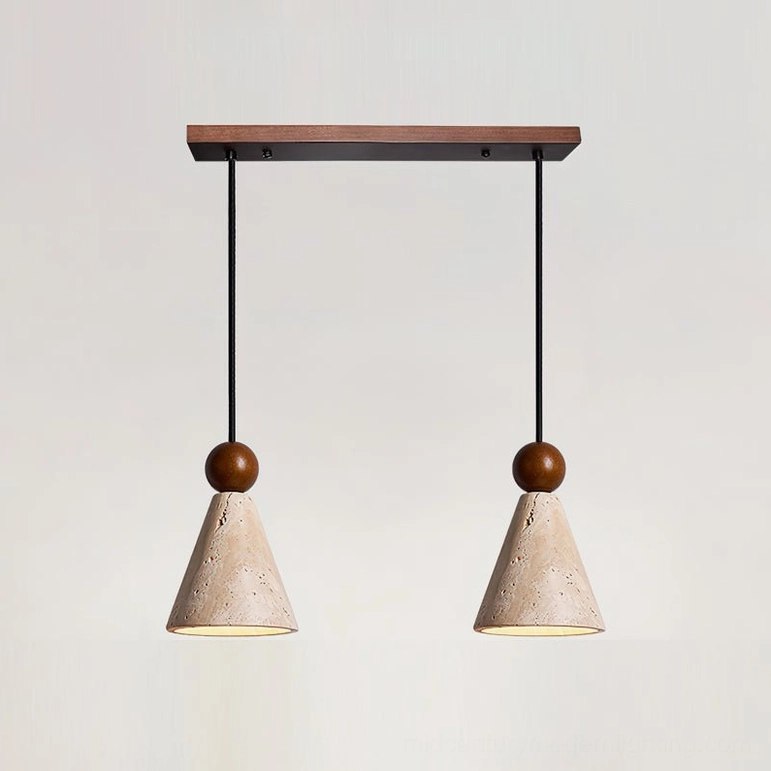 Two-light linear Canyon travertine pendant configuration above kitchen breakfast bar countertop