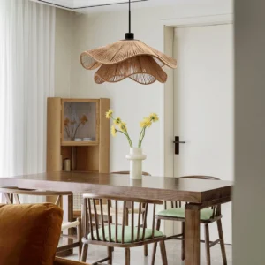 Natural hemp rope pendant light hanging in rustic modern dining room with warm neutral decor and double-layer woven shade