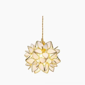 Capiz pendant light featuring translucent glass petal sphere with brass framework in studio overhead view