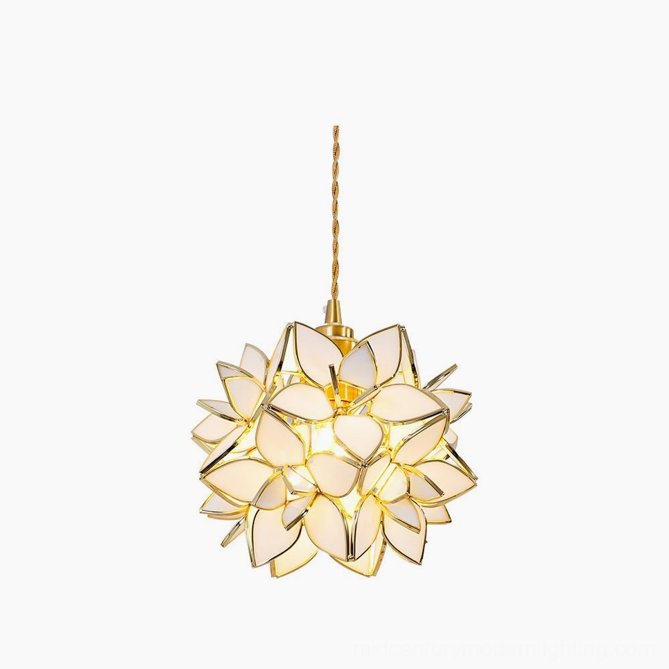 Capiz pendant light featuring translucent glass petal sphere with brass framework in studio overhead view
