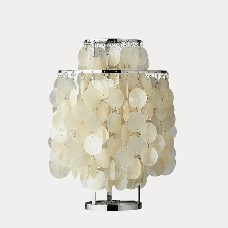 Capiz shell table lamp in bohemian coastal home interior with artistic styling