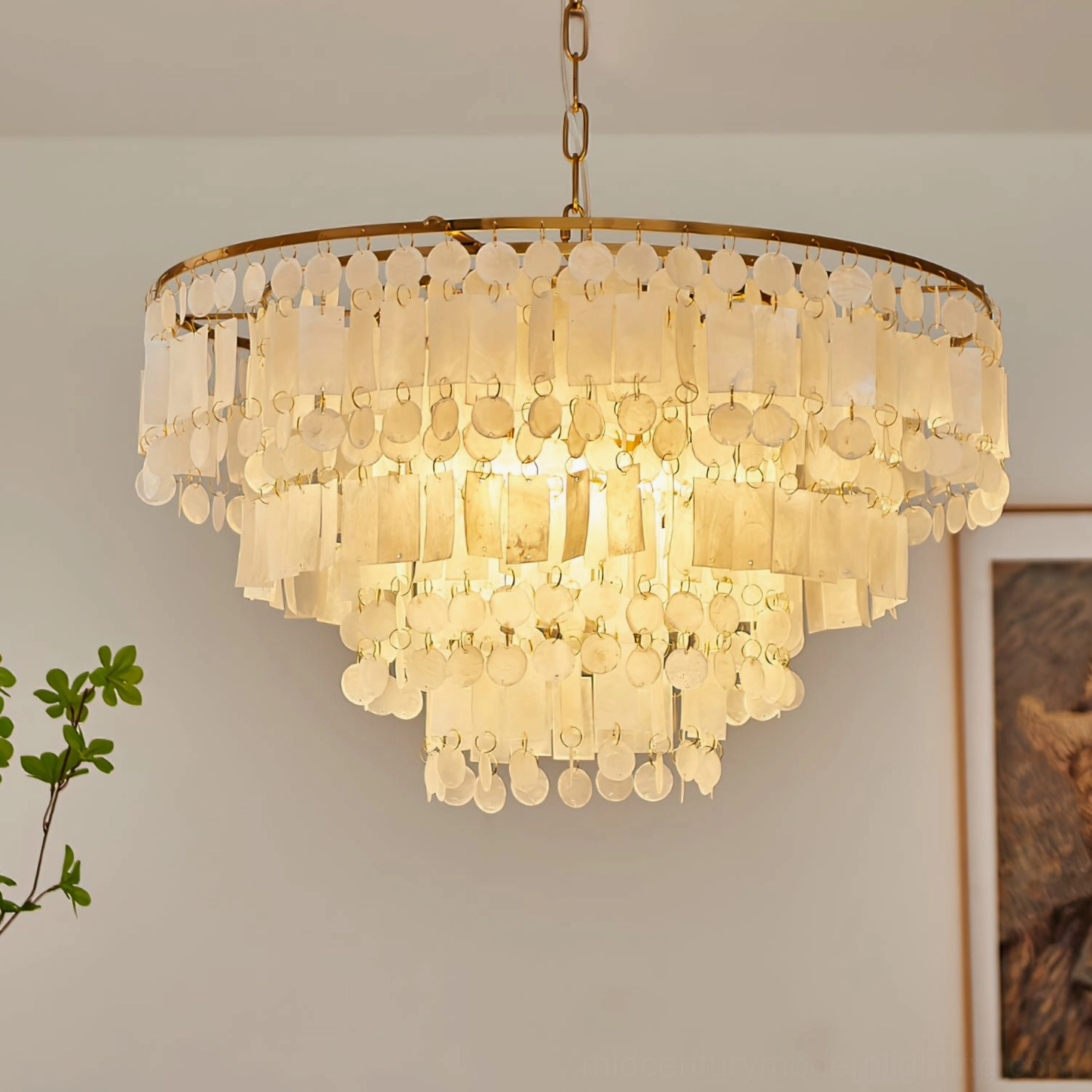 Capiz shell chandelier in elegantly furnished room showing fixture as focal point with complementary decor and lighting effect