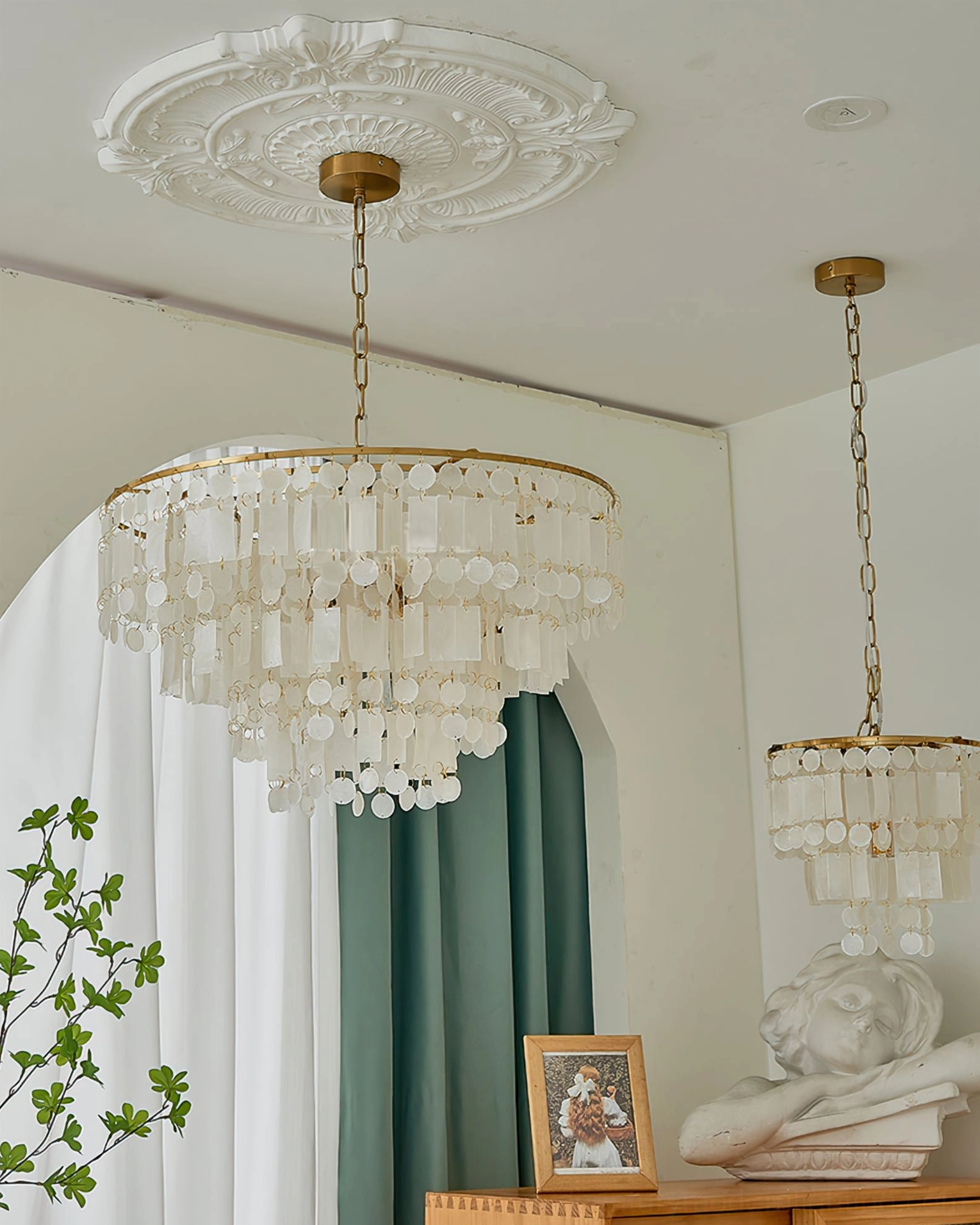 Capiz shell chandelier full fixture view showcasing layered shell design, gold metal construction, and elegant proportions