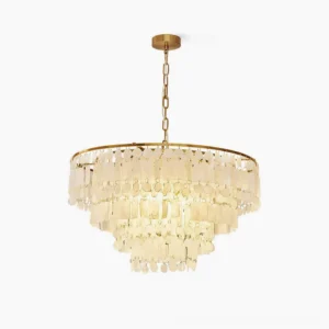 Capiz shell chandelier with tiered white shell design and gold metal frame on white background, luxury coastal lighting fixture