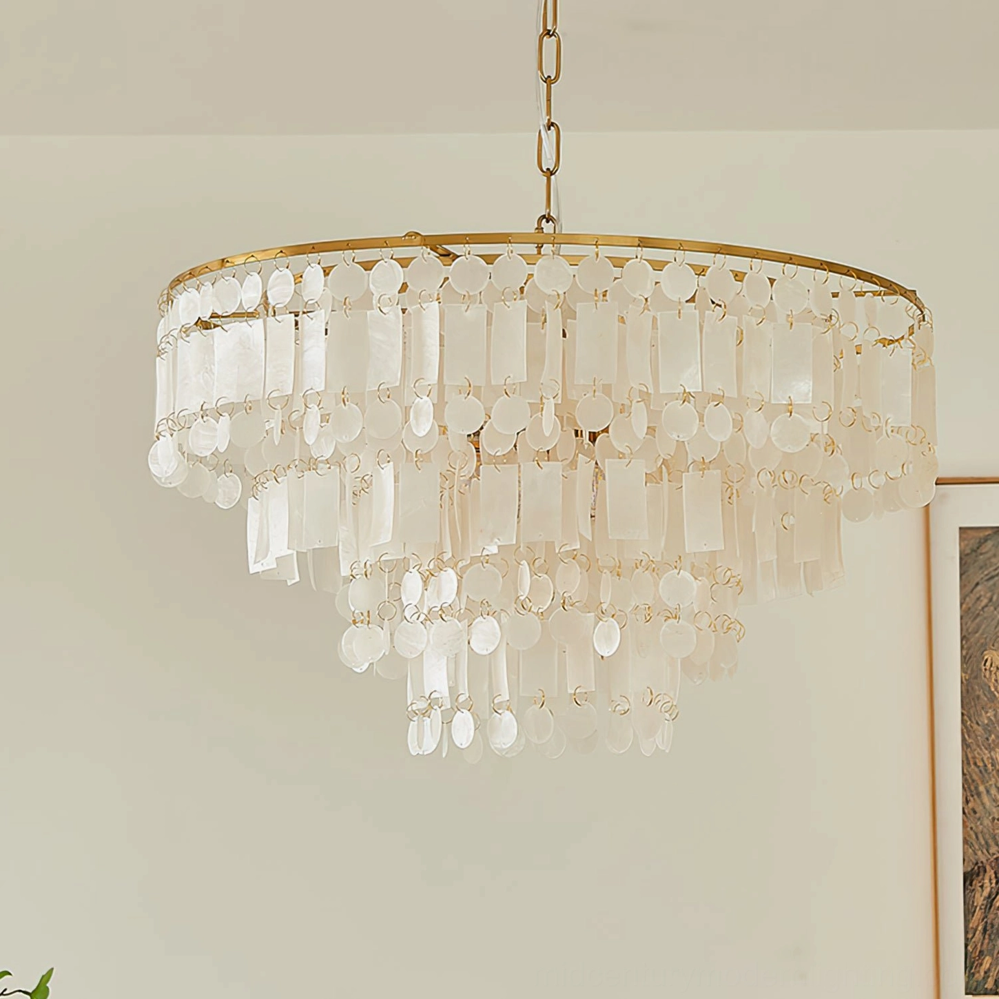Capiz shell chandelier styled in modern interior demonstrating how fixture complements contemporary home design aesthetics