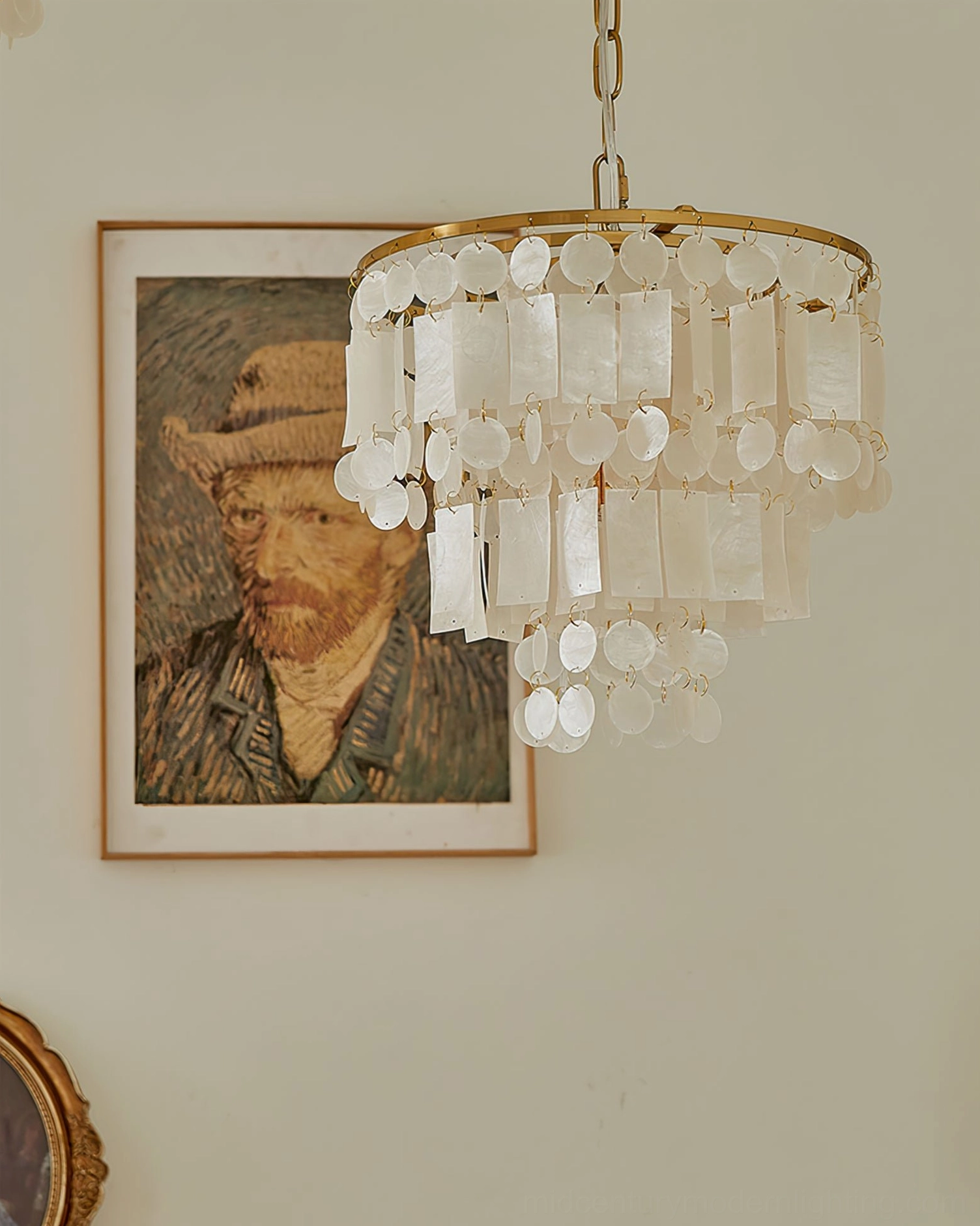 Capiz shell chandelier suspended from ceiling showing complete fixture with cascading shell layers and metal mounting hardware