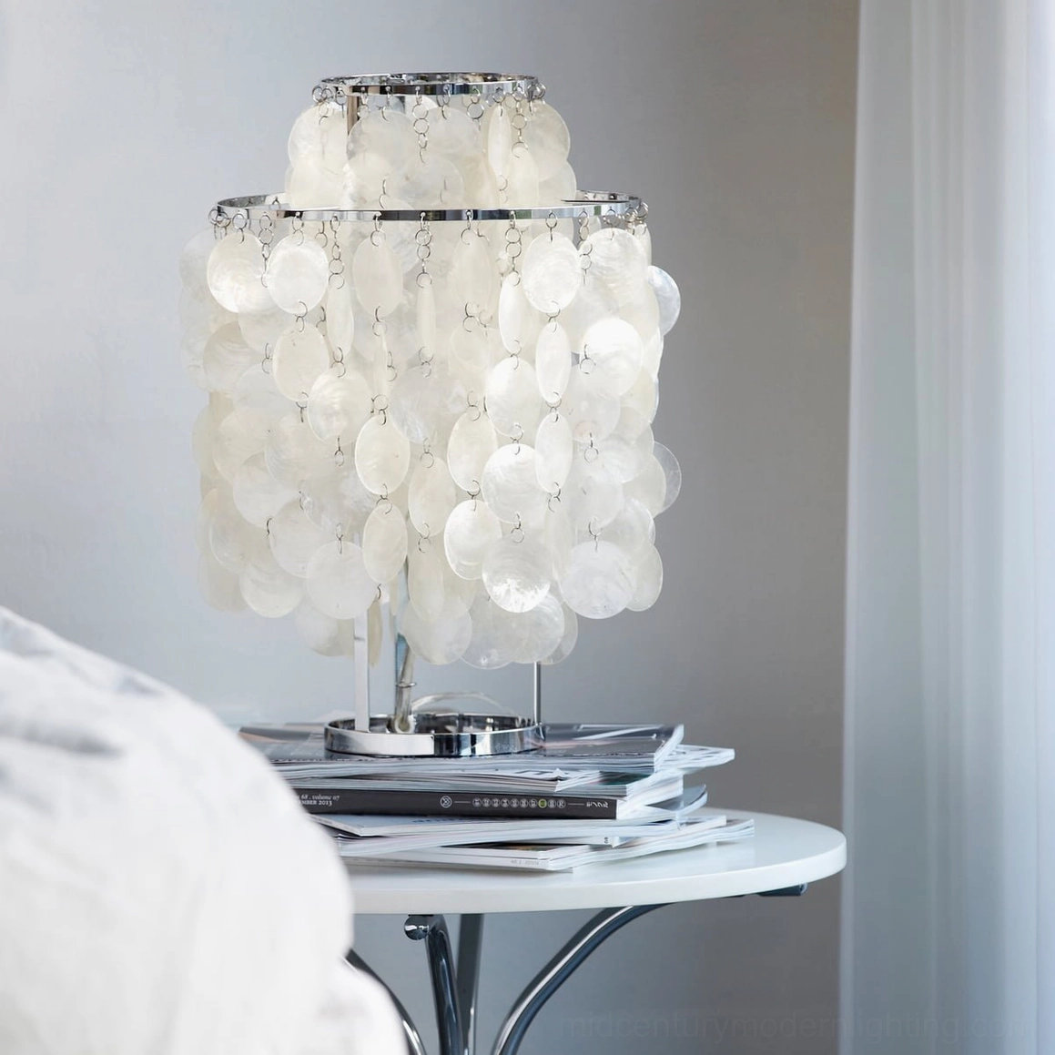 Contemporary capiz shell pendant lamp in minimalist bedroom or study space