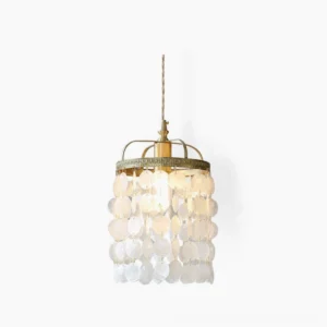 Capiz shell pendant light with natural mother-of-pearl shells suspended in brass frame against white background