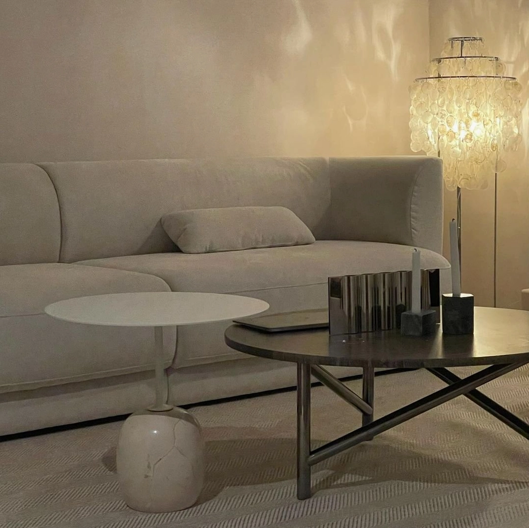 Hand-assembled mother of pearl capiz shell floor lamp with stainless steel rings detail view