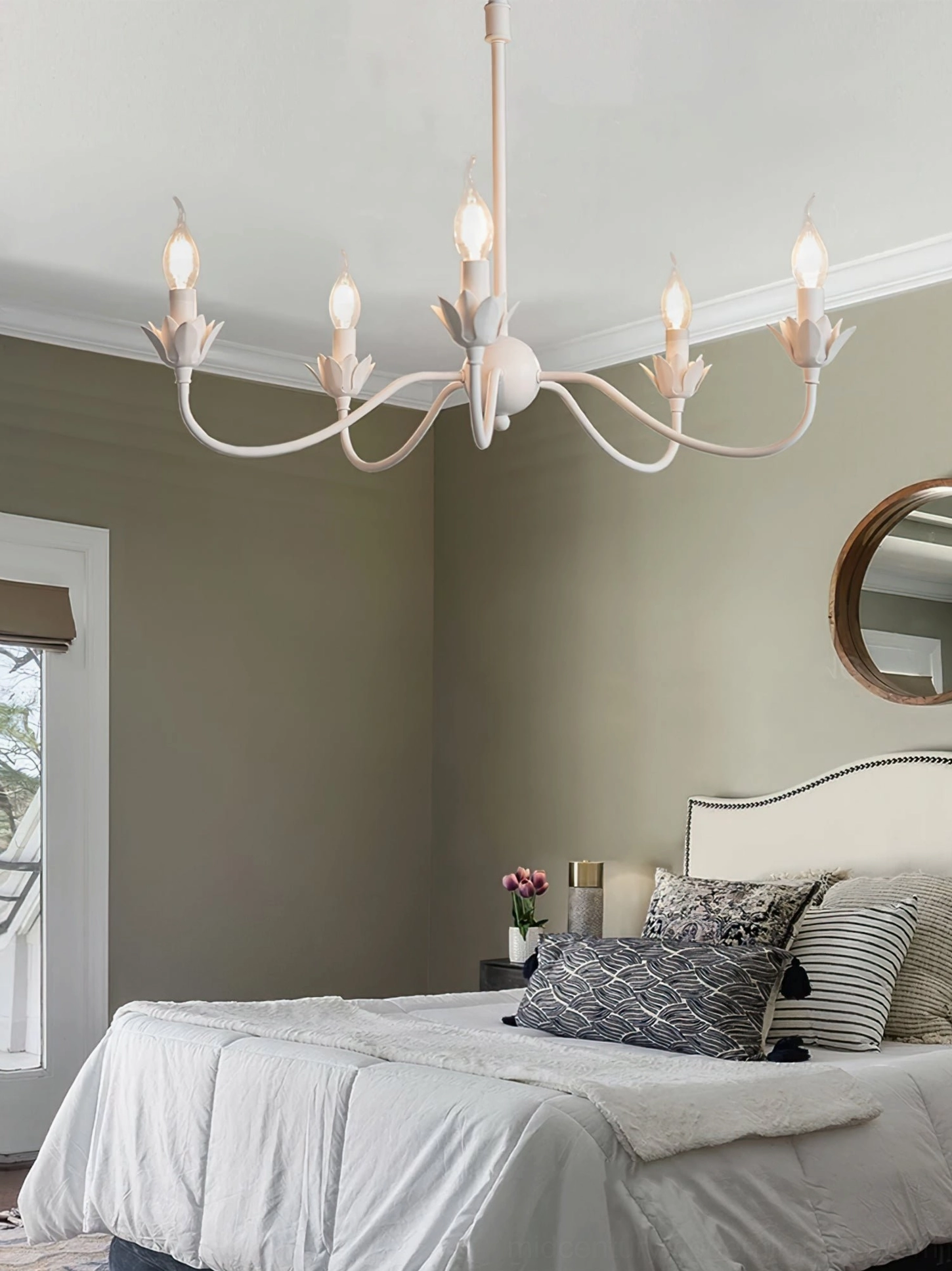 Caposile 5-light white chandelier installed in modern minimalist master bedroom