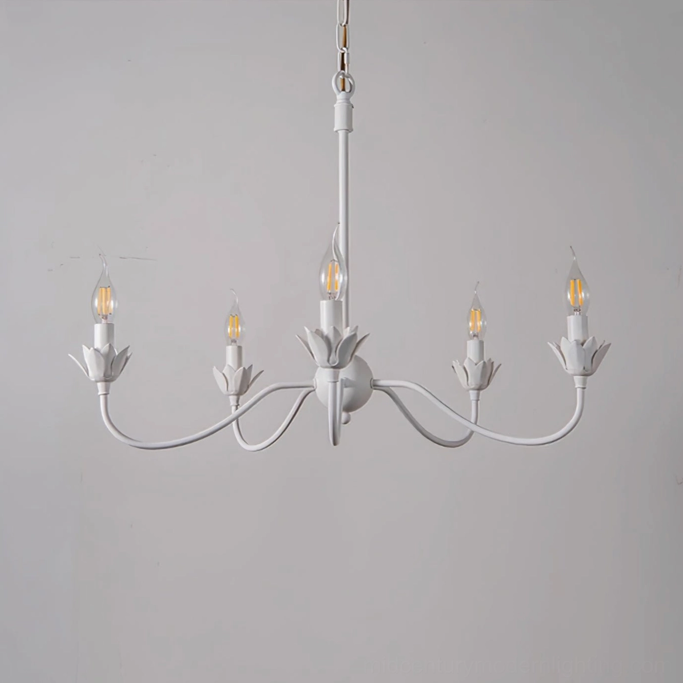 Caposile 5-light white candle-style chandelier three-quarter front view