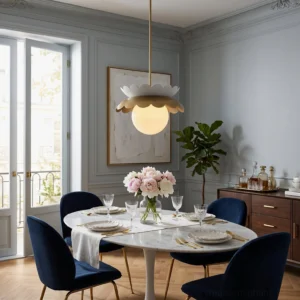 Mid-century modern Capri globe pendant illuminated above elegant formal dining table with French windows