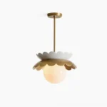 Capri scalloped globe pendant light with gold brass hardware and frosted white glass, front studio view