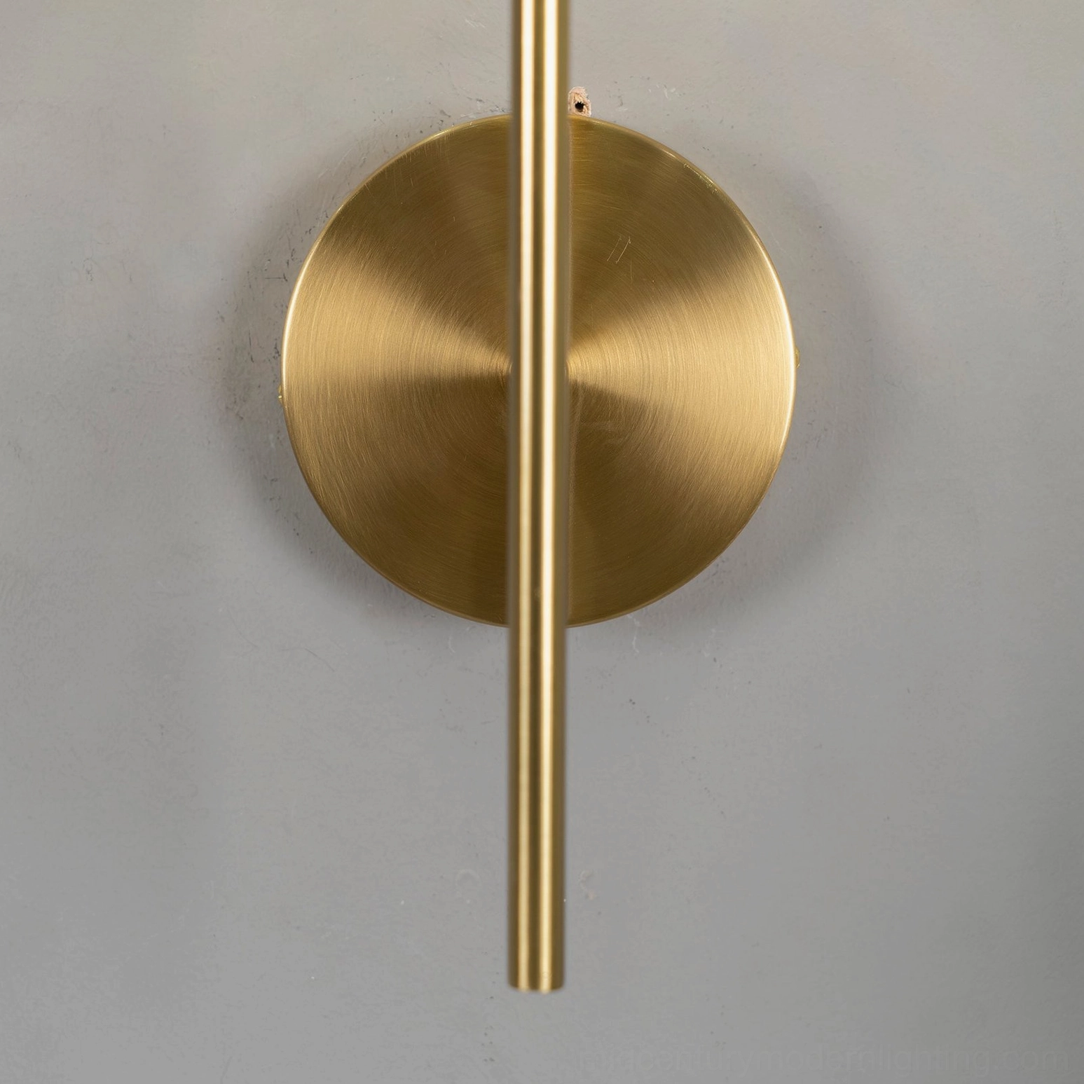 Capsule-shaped glass sconce showing elongated silhouette and amber glass option
