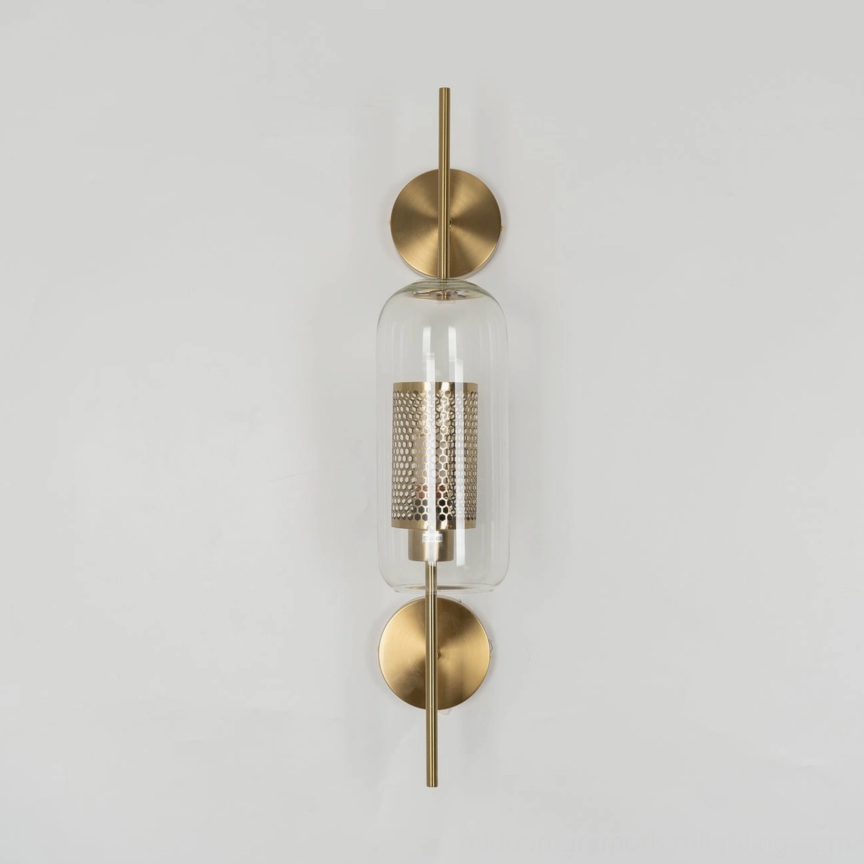 Modern glass wall sconce with capsule shape and warm color tone rendering
