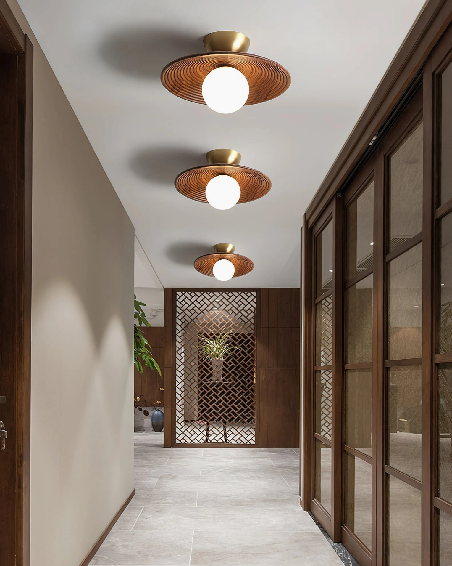 Multiple Carapace ceiling lights installed in residential hallway corridor mid-century modern aesthetic walnut finish
