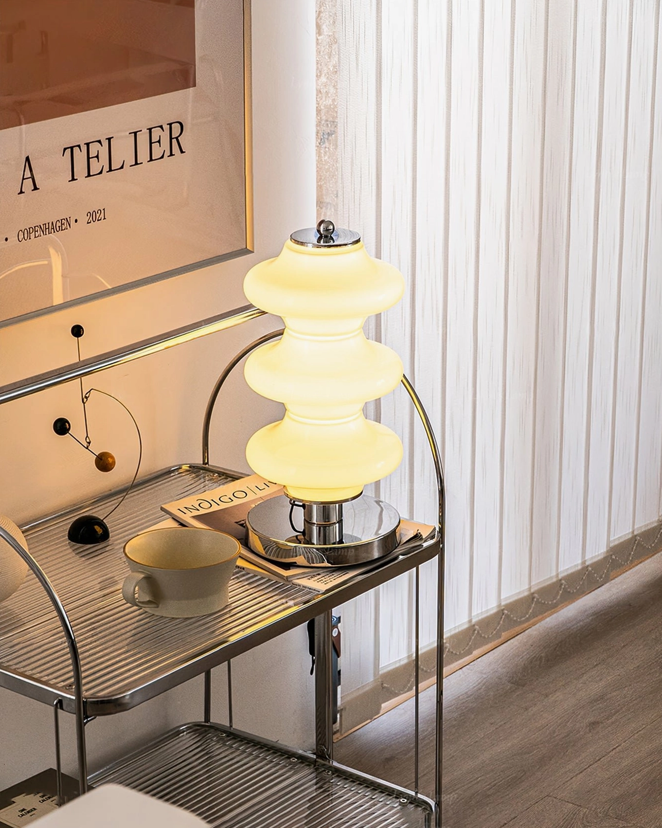 Carlo chrome table lamp sculptural presence as functional art accent piece elevating room design aesthetic